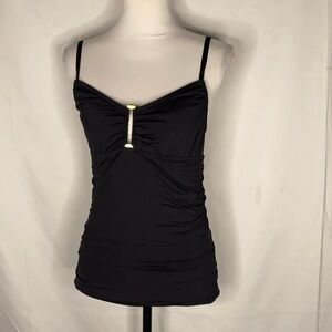 Black tankini type top with gold buckle insert on neckline and gathered at sides